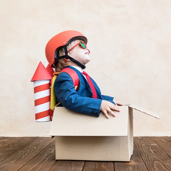 child playing in box