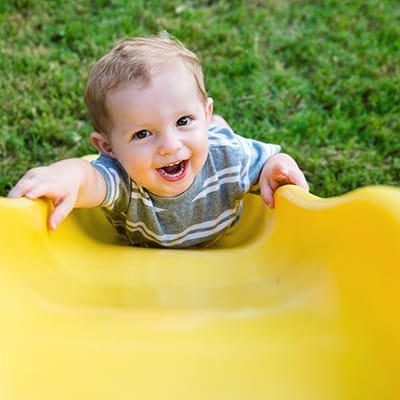 toddler on slide